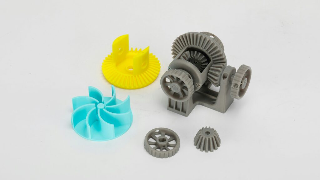 3D printed mechanical components on a workbench